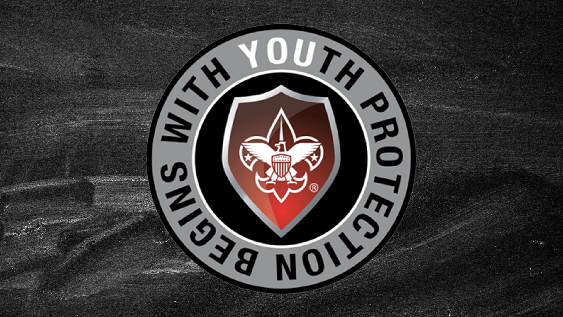A circle saying "Youth Protection Begins with You" (the you in youth and at the end connect back together) with the BSA logo in a red shield in the center.