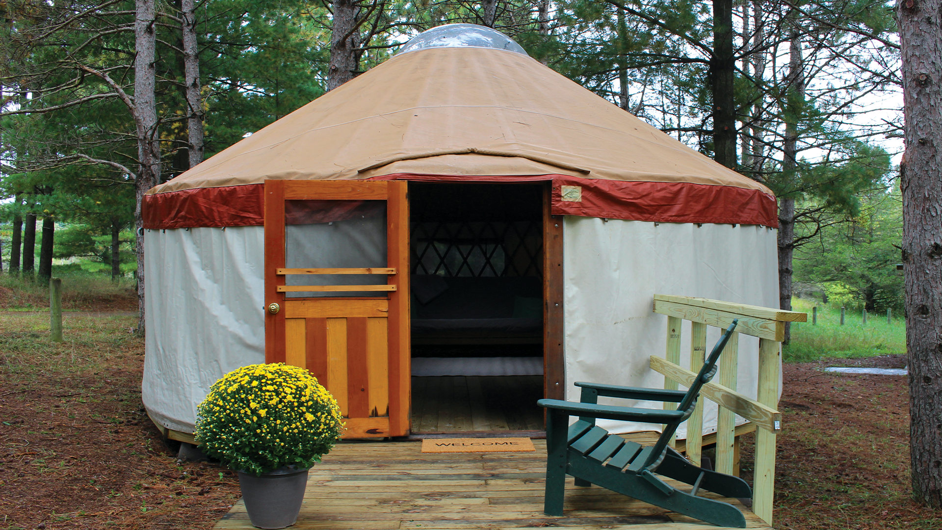 A photo of the outside of a yurt at Stearns Scout Camp, one of the several types of facilities we have available for families to rent.